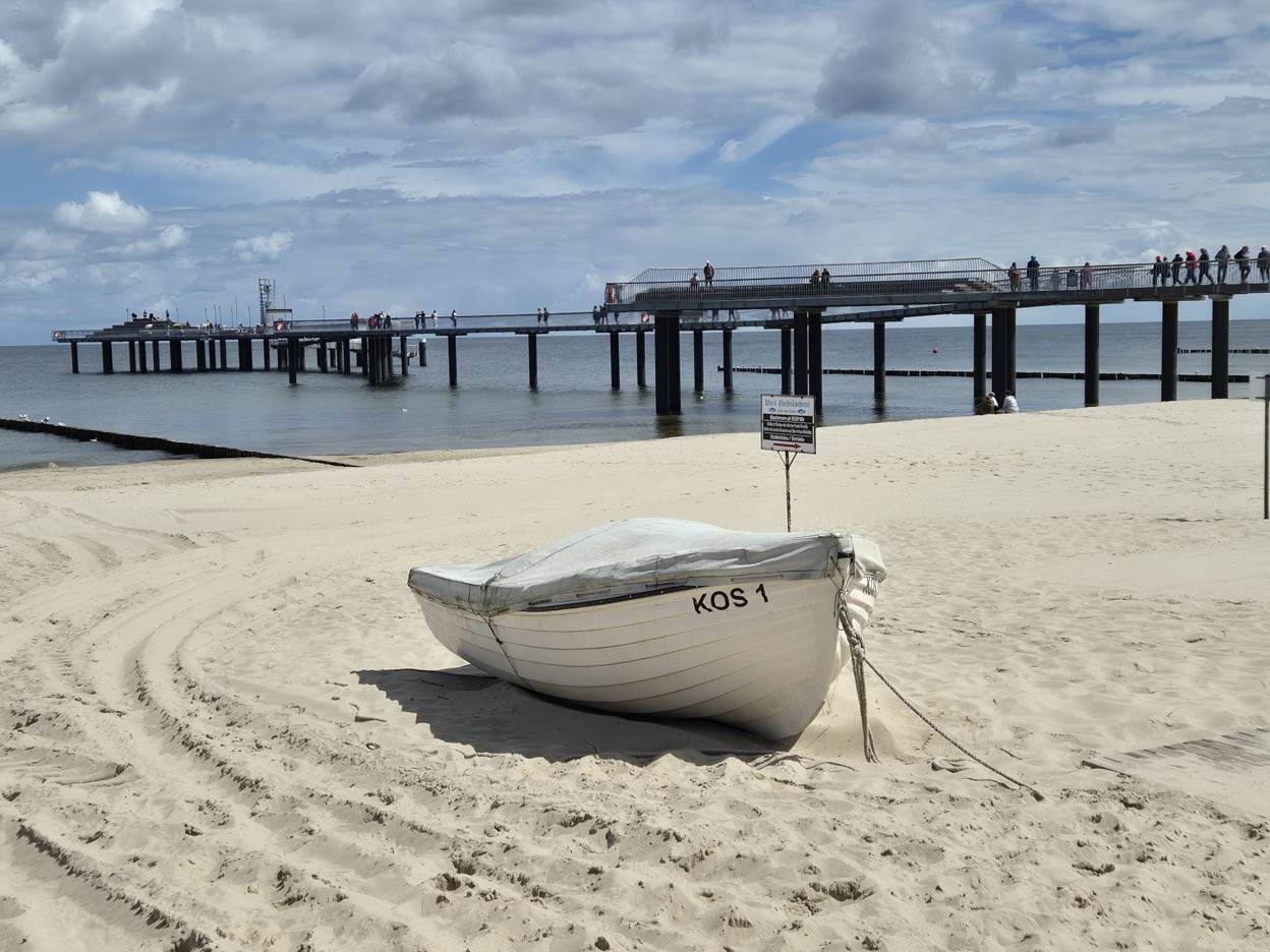 Ein Bild, das drauen, Strand, Gelnde, Wolke enthlt.

Automatisch generierte Beschreibung