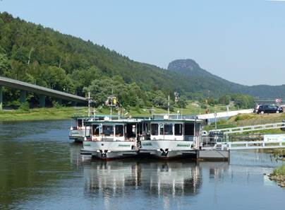 Ein Bild, das Wasser, drauen, Berg, Boot enthlt.

Automatisch generierte Beschreibung